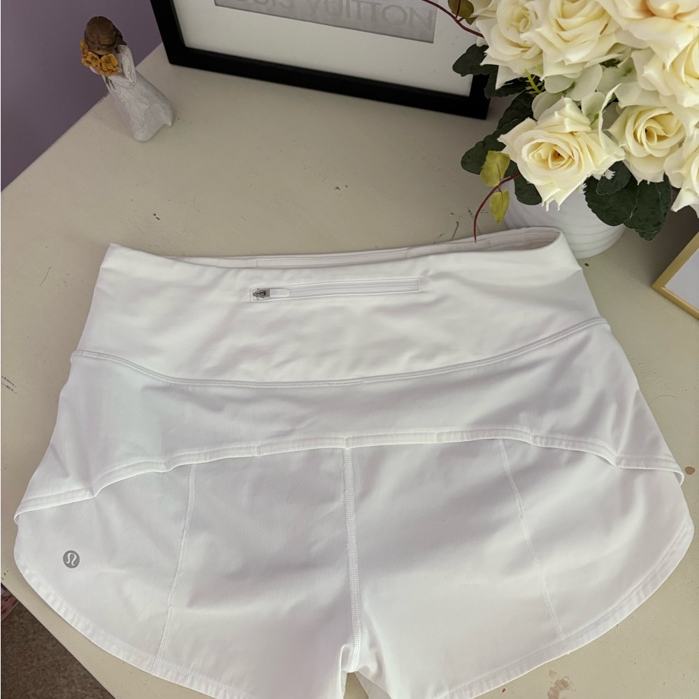 White lululemon high rise speed up shorts 2.5